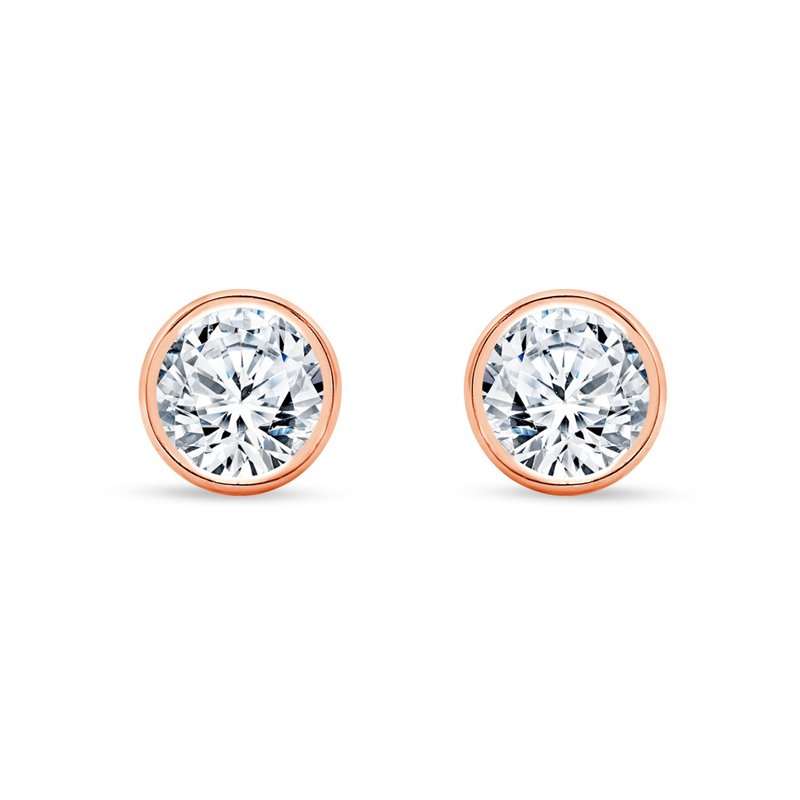 Boucles d'oreilles serti clos diamant en or 18 carats