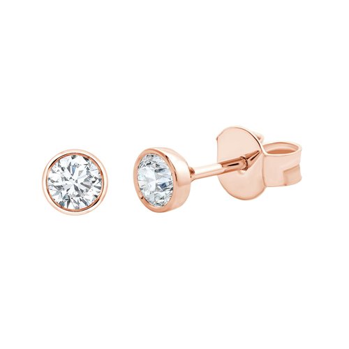 Boucles d'oreilles serti clos diamant en or 18 carats