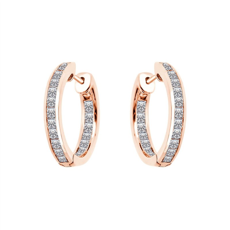 Boucles d'oreilles serti clos diamant en or 18 carats