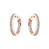 Boucles d'oreilles serti clos diamant en or 18 carats