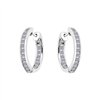 Boucles d'oreilles serti clos diamant en or 18 carats