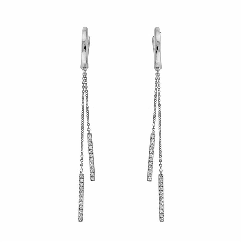 Boucles d'oreilles serti clos diamant en or 18 carats