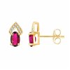 Boucles d'oreilles rubis et diamant en or 18 carats