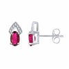 Boucles d'oreilles rubis et diamant en or 18 carats
