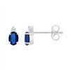 Boucles d'oreilles serti clos saphir et diamant en or 18 carats