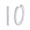 Boucles d'oreilles serti clos diamant en or 18 carats