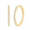 Boucles d'oreilles serti clos diamant en or 18 carats