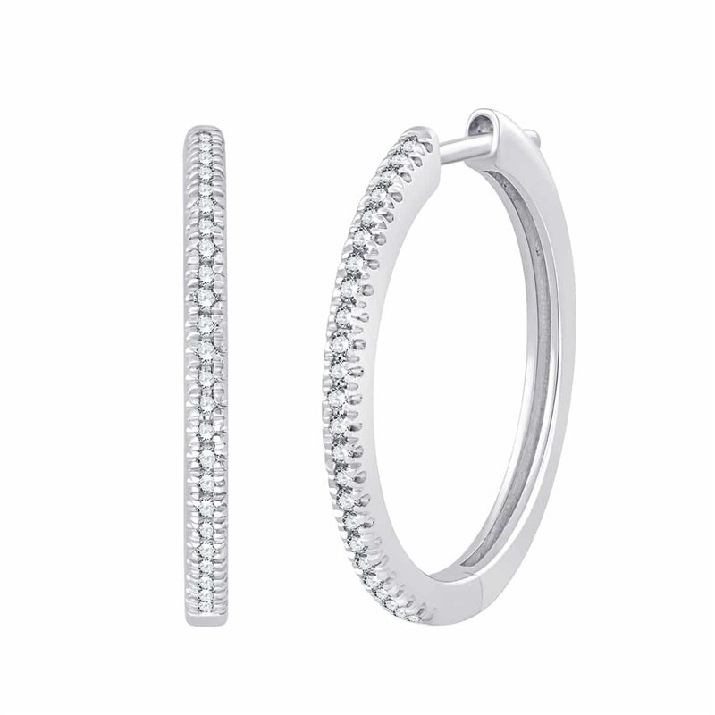Boucles d'oreilles serti clos diamant en or 18 carats