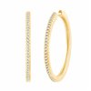 Boucles d'oreilles serti clos diamant en or 18 carats