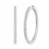 Boucles d'oreilles serti clos diamant en or 18 carats