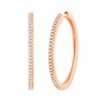 Boucles d'oreilles serti clos diamant en or 18 carats
