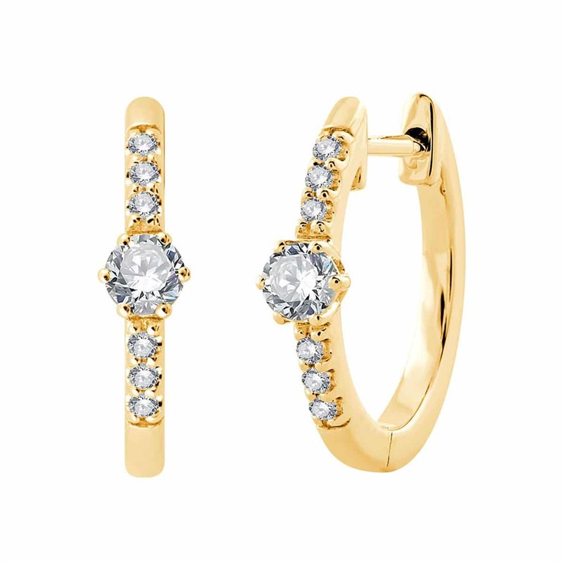 Boucles d'oreilles serti clos diamant en or 18 carats