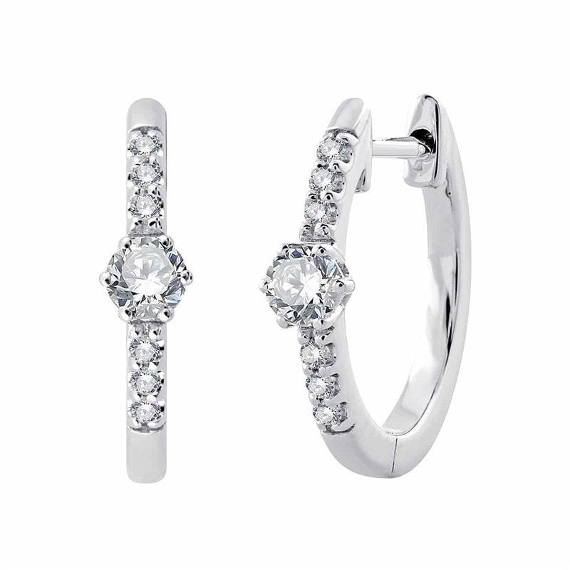 Boucles d'oreilles serti clos diamant en or 18 carats