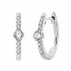 Boucles d'oreilles serti clos diamant en or 18 carats