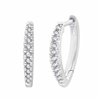 Boucles d'oreilles serti clos diamant en or 18 carats