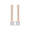 Boucles d'oreilles serti clos diamant en or 18 carats