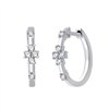 Boucles d'oreilles serti clos diamant en or 18 carats