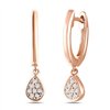 Boucles d'oreilles serti clos diamant en or 18 carats