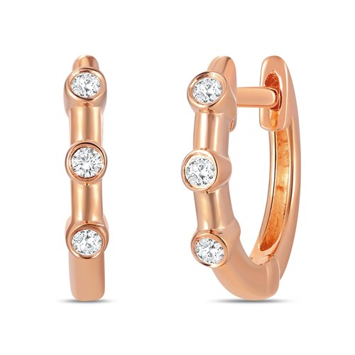 Boucles d'oreilles serti clos diamant en or 18 carats
