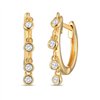 Boucles d'oreilles serti clos diamant en or 18 carats