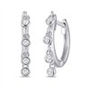 Boucles d'oreilles serti clos diamant en or 18 carats