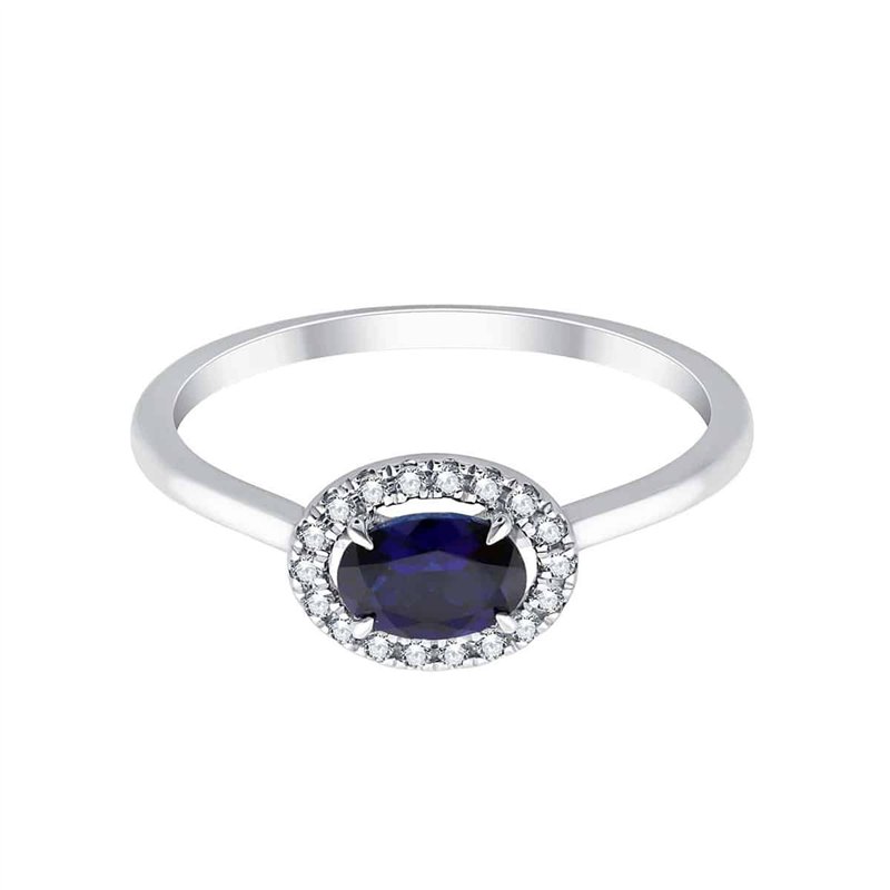 Bague serti clos saphir et diamant en or 18 carats