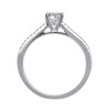 Solitaire accompagné serti clos diamant en or 18 carats