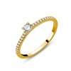 Solitaire accompagné serti clos diamant en or 18 carats
