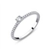 Solitaire accompagné serti clos diamant en or 18 carats