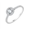 Solitaire accompagné serti clos diamant en or 18 carats