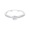Solitaire accompagné serti clos diamant en or 18 carats