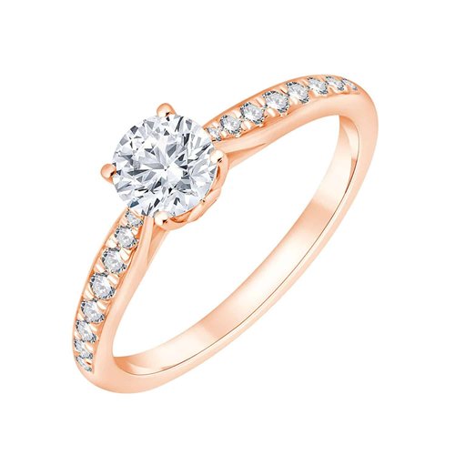 Solitaire accompagné serti clos diamant en or 18 carats