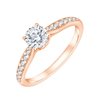 Solitaire accompagné serti clos diamant en or 18 carats