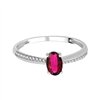 Bague serti clos rubis et diamant en or 18 carats