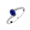 Bague serti clos saphir et diamant en or 18 carats