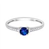 Bague serti clos saphir et diamant en or 18 carats