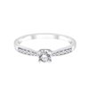 Solitaire accompagné serti clos diamant en or 18 carats