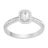 Solitaire entouré Caprice serti clos diamant et émeraude en or 18 carats
