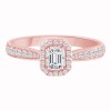 Solitaire entouré Caprice serti clos diamant et émeraude en or 18 carats
