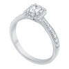 Solitaire entouré Caprice serti clos diamant et émeraude en or 18 carats