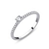 Solitaire accompagné Eïko serti clos diamant en or 18 carats