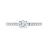 Solitaire accompagné Eïko serti clos diamant en or 18 carats