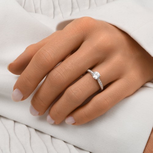 Solitaire accompagné Eïko diamant en or 18 carats